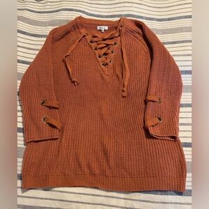Women’s sweater size medium/large.